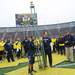 Co-MVPs Alijah Bradley and John Wangler pose with the MVP trophy after the Victors Classic alumni football game at Michigan Stadium on Saturday. Melanie Maxwell I AnnArbor.com